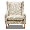 reading chair in cream linen with pale green paisley design