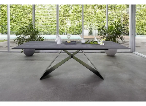 essie dining table showing steel zig zag leg