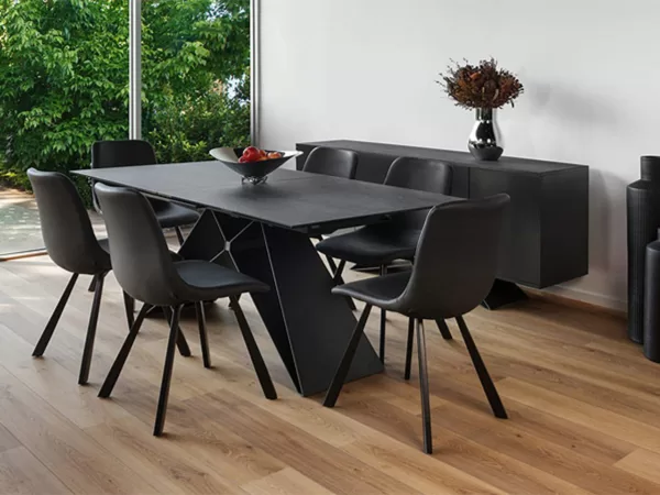 grey dining table with black chairs